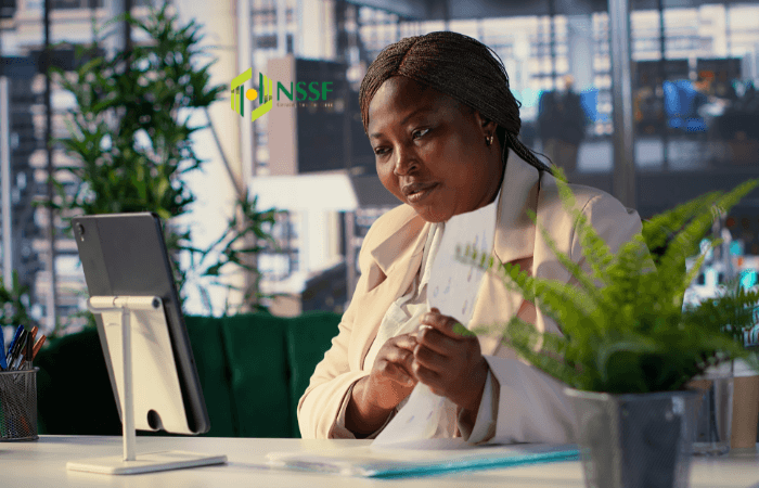 Payroll specialist calculating NSSF rates